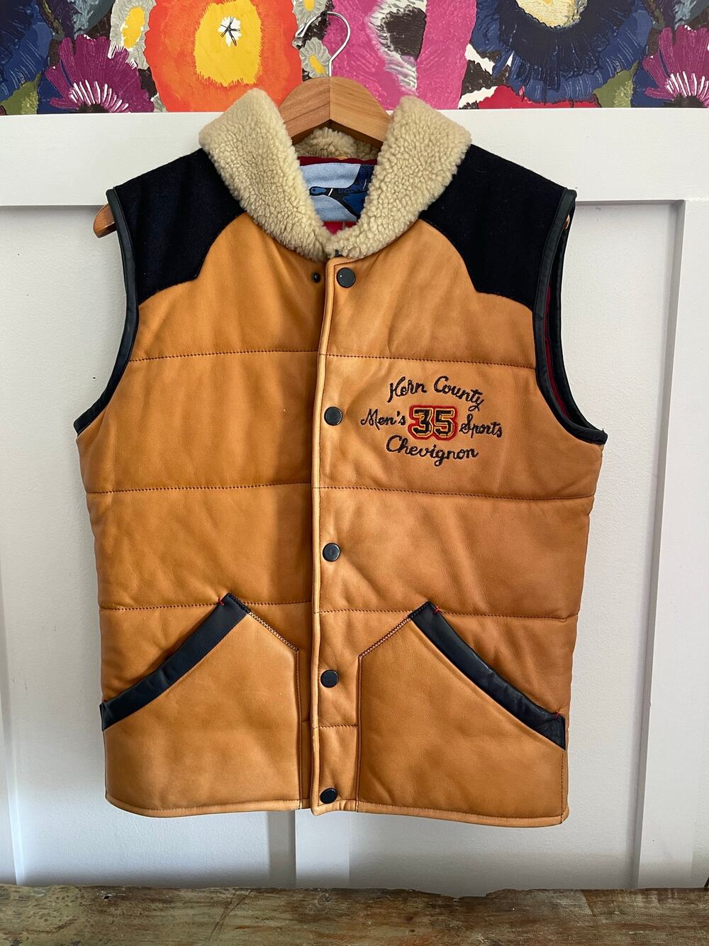 Chevignon mens down filled leather vest